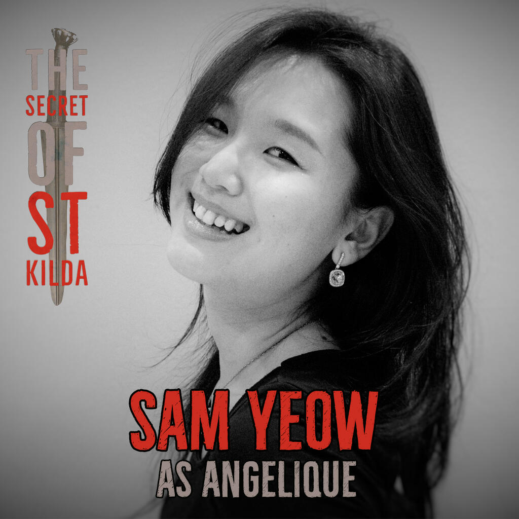 Sam Yeow as Angelique. Smiling black and white headshot of asian woman with long black hair looking over one shoulder