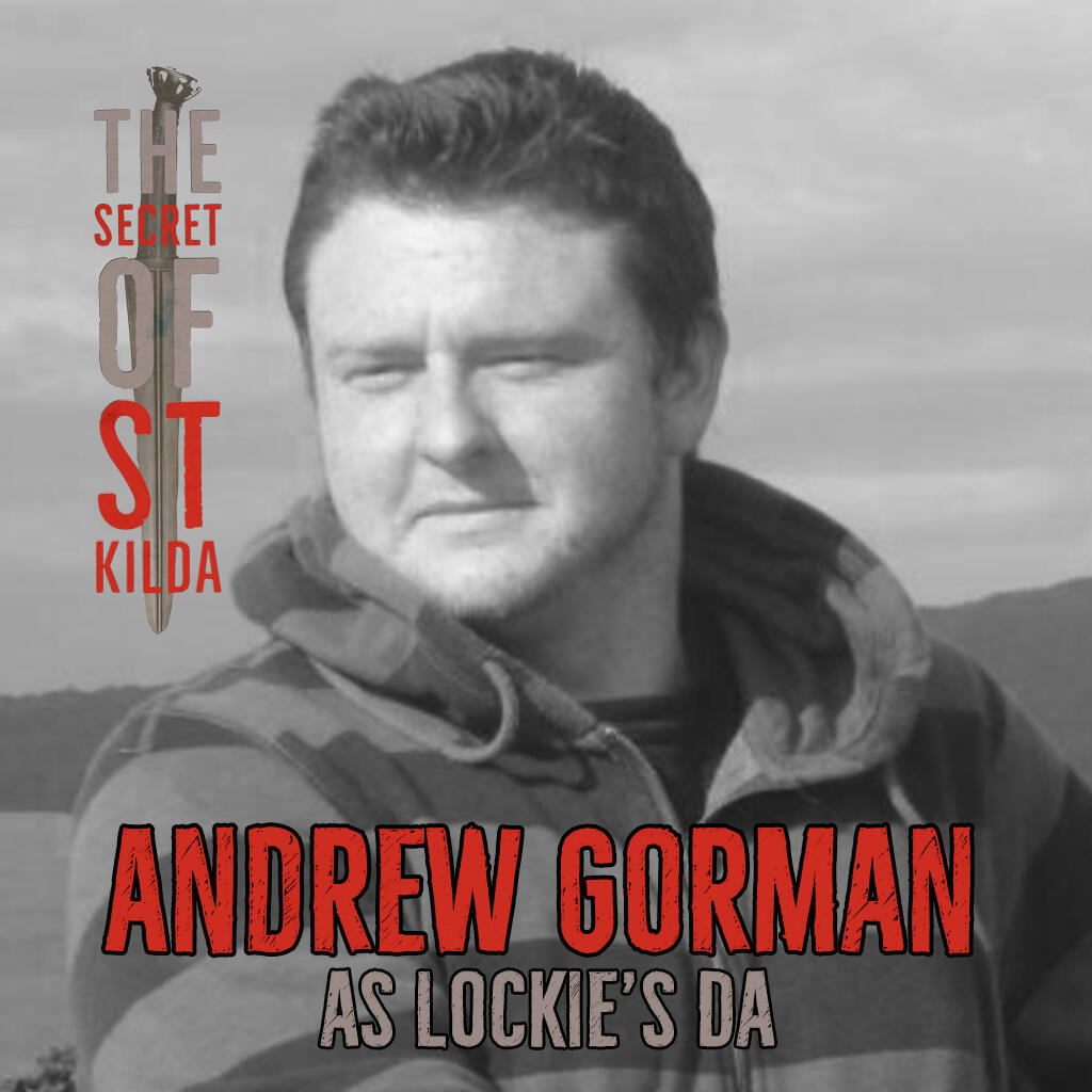 Andrew Gorman as Lockie's Da. Black and white headshot of a man with short dark hair wearing a hoodie.